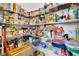 Walk-in pantry with wire shelving, stocked full of food and household items at 7545 Roseberry Way, Lithonia, GA 30038