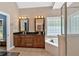 Spacious bathroom featuring double vanity, soaking tub, and separate shower at 7801 Windswept Way, Douglasville, GA 30135