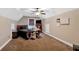 Spacious bedroom with a vaulted ceiling and functional desk area at 7801 Windswept Way, Douglasville, GA 30135