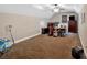 Large bedroom with a vaulted ceiling, ceiling fan, and desk area at 7801 Windswept Way, Douglasville, GA 30135