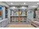 Finished basement bar with granite countertops, seating, and custom cabinetry at 8132 Union Hill Rd, Canton, GA 30115