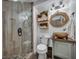 Bathroom featuring a glass shower, unique vanity, and modern fixtures at 8132 Union Hill Rd, Canton, GA 30115