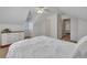 Bedroom with white walls, ceiling fan, dresser and plush carpet at 8132 Union Hill Rd, Canton, GA 30115