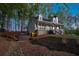 Stunning two-story home with a charming front porch and relaxing hot tub at 8132 Union Hill Rd, Canton, GA 30115