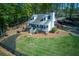 Lovely two-story home with a charming front porch and a well-manicured lawn at 8132 Union Hill Rd, Canton, GA 30115