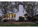 Charming two-story home featuring a cozy front porch and meticulous landscaping at 8132 Union Hill Rd, Canton, GA 30115