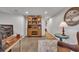 Basement office space featuring built in hutch and an accent table at 8132 Union Hill Rd, Canton, GA 30115