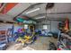 Interior of shed with lawnmower and organized storage racks at 8132 Union Hill Rd, Canton, GA 30115