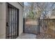 Back entrance featuring security door and access to a small fenced area, offering both safety and a private outdoor space at 1415 Eric Se St, Atlanta, GA 30315