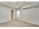 Inviting bedroom with soft carpeting, neutral paint, and a window for natural light, offering a serene atmosphere at 1415 Eric Se St, Atlanta, GA 30315