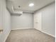 Cozy bedroom featuring neutral walls, plush carpet, and ample closet space, offering a comfortable and inviting retreat at 1415 Eric Se St, Atlanta, GA 30315