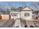 Charming single-story home featuring a fenced yard, mature trees, and welcoming front entrance at 1415 Eric Se St, Atlanta, GA 30315