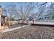 Street view of a charming single-story home featuring a fenced yard and landscaping at 1415 Eric Se St, Atlanta, GA 30315