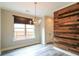 Dining area featuring chandelier, natural light, and decorative wall at 2331 Bouldercliff Se Way, Atlanta, GA 30316