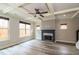 Bright living room featuring coffered ceiling, neutral walls, fireplace and hardwood floors at 2331 Bouldercliff Se Way, Atlanta, GA 30316