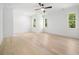 Bright bedroom with hardwood floors, multiple windows and great natural lighting at 3920 Bellair Dr, Marietta, GA 30066