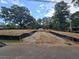 Picture of residential land undergoing construction showing a clearing and preparation for building at 3920 Bellair Dr, Marietta, GA 30066