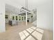 Open-concept living area with kitchen, staircase, fireplace, and recessed lighting at 3920 Bellair Dr, Marietta, GA 30066