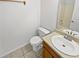 A minimalist bathroom with a toilet, sink and shower/tub combo at 823 New Hope Rd, Mcdonough, GA 30252