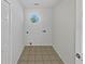 A dedicated laundry room with tile flooring, utility sink hook ups at 823 New Hope Rd, Mcdonough, GA 30252