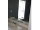 Bathroom featuring a white sink vanity and a window with closed blinds at 9399 Whaleys Lake Ln, Jonesboro, GA 30238