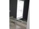 Bathroom featuring a white sink vanity and a window with closed blinds at 9399 Whaleys Lake Ln, Jonesboro, GA 30238