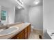 Bathroom featuring double sinks with wood cabinets at 131 Diamond Ct, Carrollton, GA 30116
