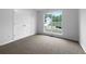 Bedroom featuring a large window with bright, natural light at 131 Diamond Ct, Carrollton, GA 30116