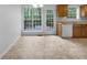 Eat-in kitchen area with lots of natural light and access to outdoor deck at 131 Diamond Ct, Carrollton, GA 30116