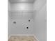 Laundry Room featuring a metal shelving unit at 131 Diamond Ct, Carrollton, GA 30116