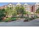 Exterior view of apartment building with landscaping, brick sign and gated entrance at 211 Colonial Homes Nw Dr # 2106, Atlanta, GA 30309