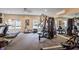 Community gym featuring modern exercise equipment and mirrored wall at 211 Colonial Homes Nw Dr # 2106, Atlanta, GA 30309