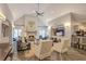 Bright, spacious living room with fireplace, ceiling fan, and stylish herringbone floors at 211 Colonial Homes Nw Dr # 2106, Atlanta, GA 30309
