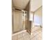 Bathroom featuring a glass-enclosed shower and separate soaking tub, creating a spa-like experience at 2608 Cascade Cove Dr, Buford, GA 30519