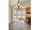 Cozy breakfast nook featuring a charming chandelier and a bay window at 2608 Cascade Cove Dr, Buford, GA 30519