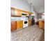 Modern kitchen with granite counters, stainless appliances and plenty of cabinet space at 2608 Cascade Cove Dr, Buford, GA 30519