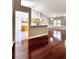Open-concept living room and kitchen showcasing hardwood flooring and great natural light at 2608 Cascade Cove Dr, Buford, GA 30519