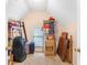 Cozy attic space with storage shelves and a window for natural light at 4034 Brockett Walk, Tucker, GA 30084