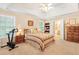 Serene bedroom with vaulted ceiling, a comfy bed, and private bathroom access at 4034 Brockett Walk, Tucker, GA 30084