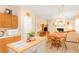 Open-concept kitchen flows into dining and living areas, promoting a sociable and welcoming home at 4034 Brockett Walk, Tucker, GA 30084