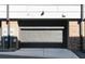 Single car garage exterior with brick facade and concrete driveway at 611 King Arnold St, Atlanta, GA 30354