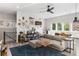 Inviting living room filled with natural light, accented by a comfy couch, stylish decor and hardwood flooring at 611 King Arnold St, Atlanta, GA 30354