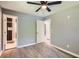 Bedroom with ceiling fan and view to ensuite bathroom at 1679 Hollyhock Ter, Decatur, GA 30032
