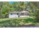 Well-maintained home with a welcoming front porch and freshly cut lawn at 1679 Hollyhock Ter, Decatur, GA 30032