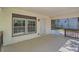 An inviting covered patio with painted brick walls and a shaded seating area at 1679 Hollyhock Ter, Decatur, GA 30032