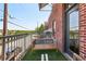 Relaxing balcony view featuring a cozy bench and wrought iron railing at 791 Wylie Se St # 102, Atlanta, GA 30312