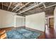 Bedroom with hardwood floors and a blue rug featuring exposed ceilings and closet space at 791 Wylie Se St # 102, Atlanta, GA 30312