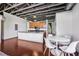 Bright kitchen and breakfast area with stainless appliances, wooden cabinets, and modern furnishings at 791 Wylie Se St # 102, Atlanta, GA 30312