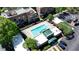 Aerial view of community pool, with landscaping, parking, and building architecture at 791 Wylie Se St # 102, Atlanta, GA 30312