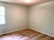 This bedroom has a neutral carpet at 997 Timbervale Ln, Lithonia, GA 30058